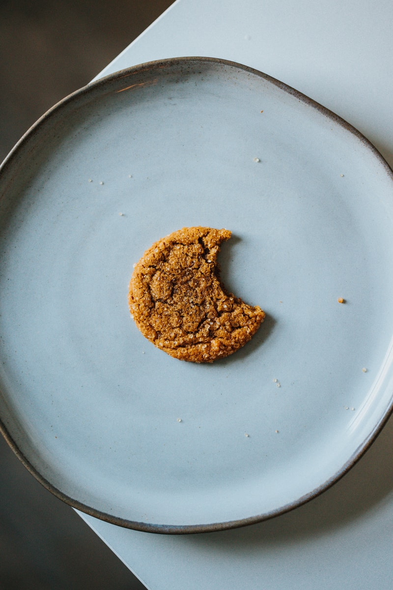 brown cookie on white ceramic plate